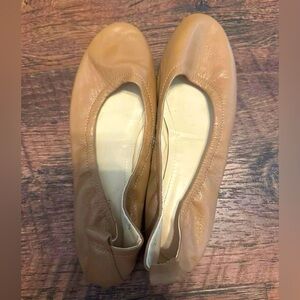 Tan ballet flats